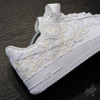 White Nike Air Force 1 custom with lace floral appliqué, pearl detailing and satin ribbon laces