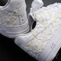 Rear and side view of white Air Force 1 custom featuring lace floral overlays and pearl accents
