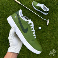 Nike Air Jordan 1 Low Golf Off The Tee custom golf sneakers in green, held on course with golf club and ball