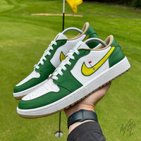 Nike Air Jordan 1 Low Golf Putting Greens 2.0 custom sneakers in hand on golf course, green and white golf shoes