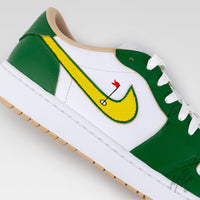 Close-up of custom Nike Air Jordan 1 Low Golf Putting Greens 2.0 with hand-painted yellow swoosh and flag detail