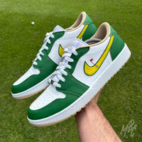 Nike Air Jordan 1 Low Golf Putting Greens 2.0 custom golf trainers in hand on course, green and white colourway