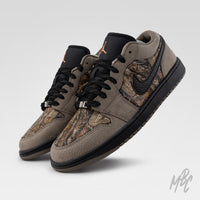 Woodland Camo Jordan 1 Low custom angled pair with brown suede and woodland camo detailing