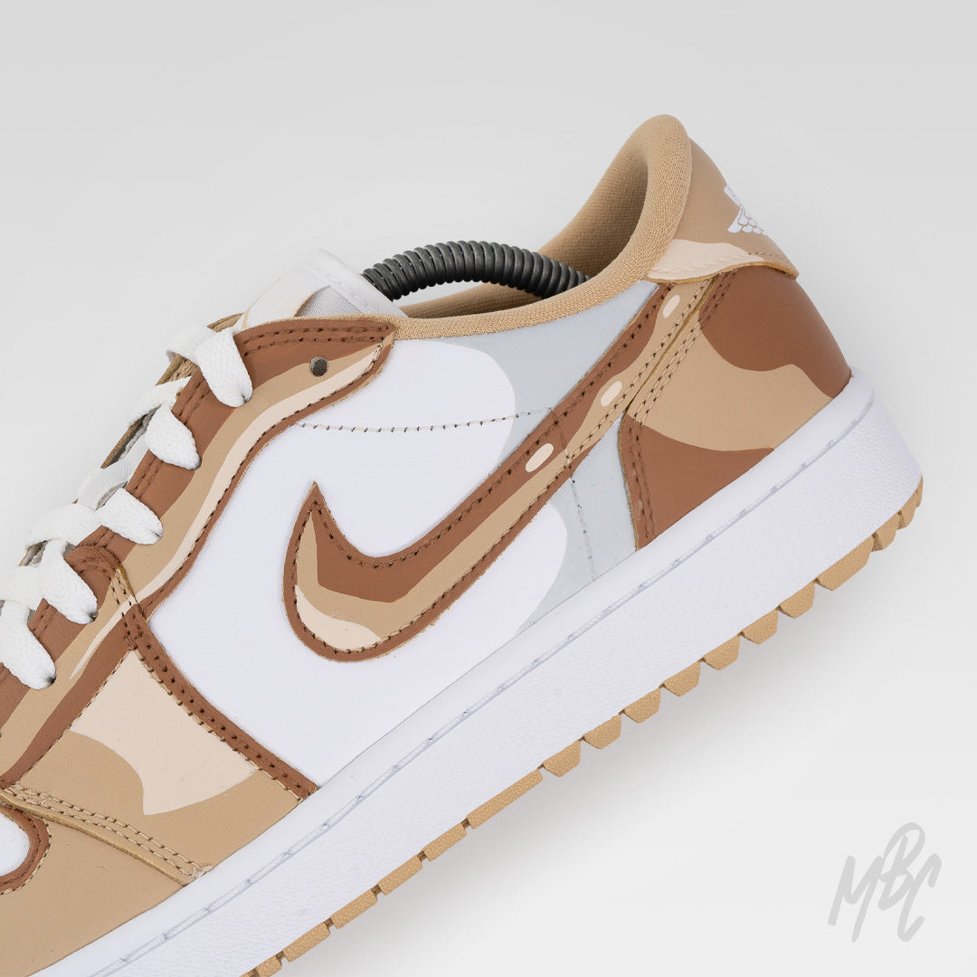 Close-up of 2D Illustration Jordan 1 Low Golf sneaker showcasing hand-painted 2D effect camouflage Swoosh and panel artwork
