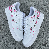 White AF1 with Japanese blossom tree painted onto the side of the trainers
