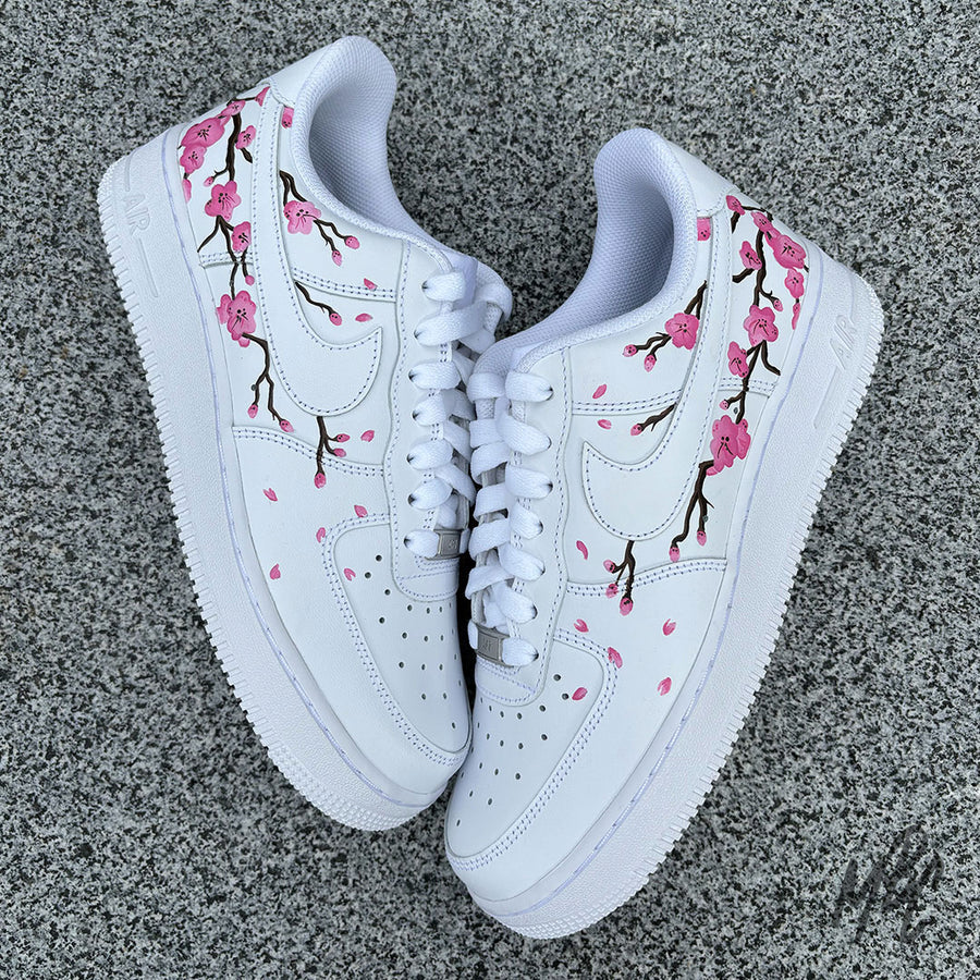 White AF1 with Japanese blossom tree painted onto the side of the trainers