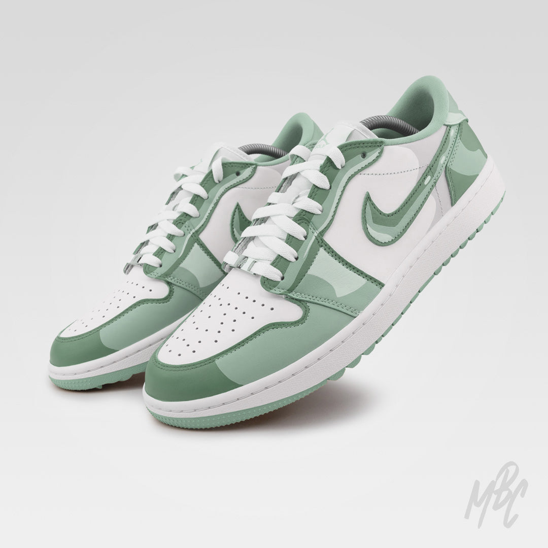 Hand-painted 2D Illustration Jordan 1 Low Golf trainers featuring cartoon-inspired camouflage detailing and premium golf-ready construction