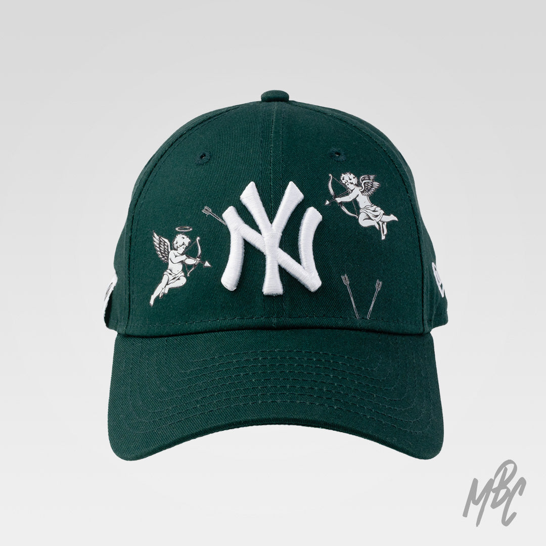 Cherub New Era NY custom cap in green with embroidered cupid angels and raised NY logo detail