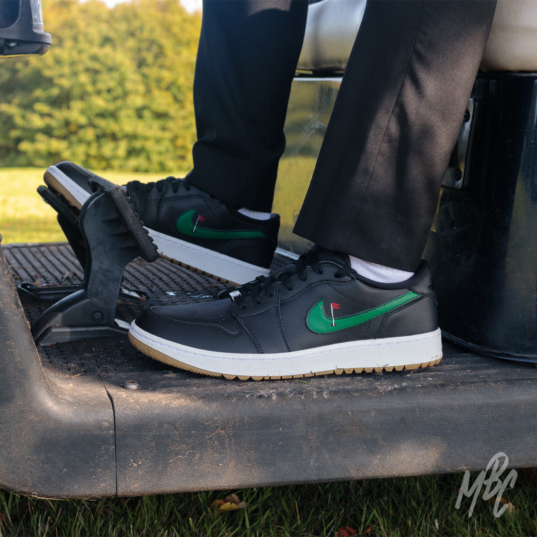 Clean on the Green Nike Jordan 1 Low Golf Custom Golf Sneakers in Black in Golf Buggy on Golf Course