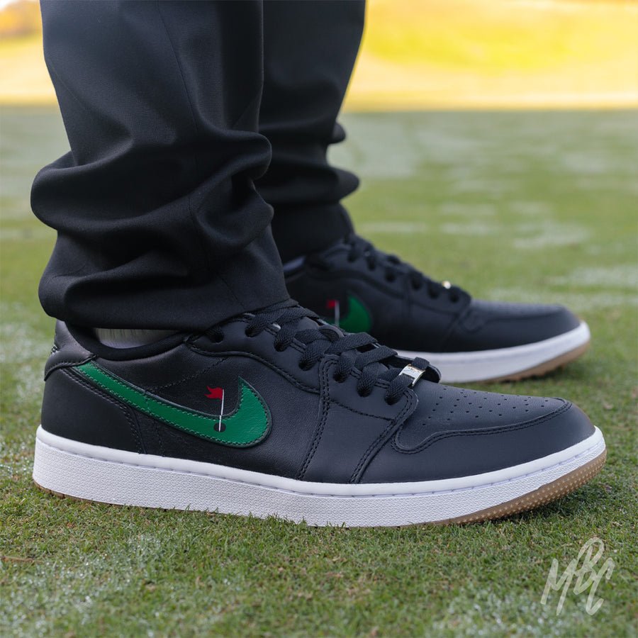 Clean on the Green Nike Jordan 1 Low Golf Custom Golf Sneakers in black on Golf Course Putting Green