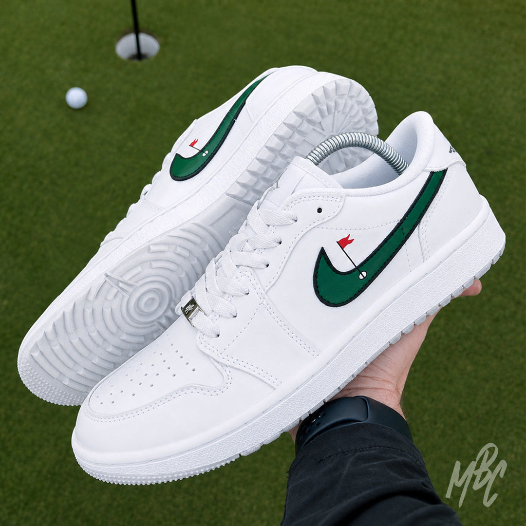 Custom Nike Jordan 1 Low Golf Sneakers in Grey on Golf Course Putting Green - Clean on the Green Nike Jordan 1 Low Golf Custom Sneakers. Putting Flag on Nike Golf Shoes