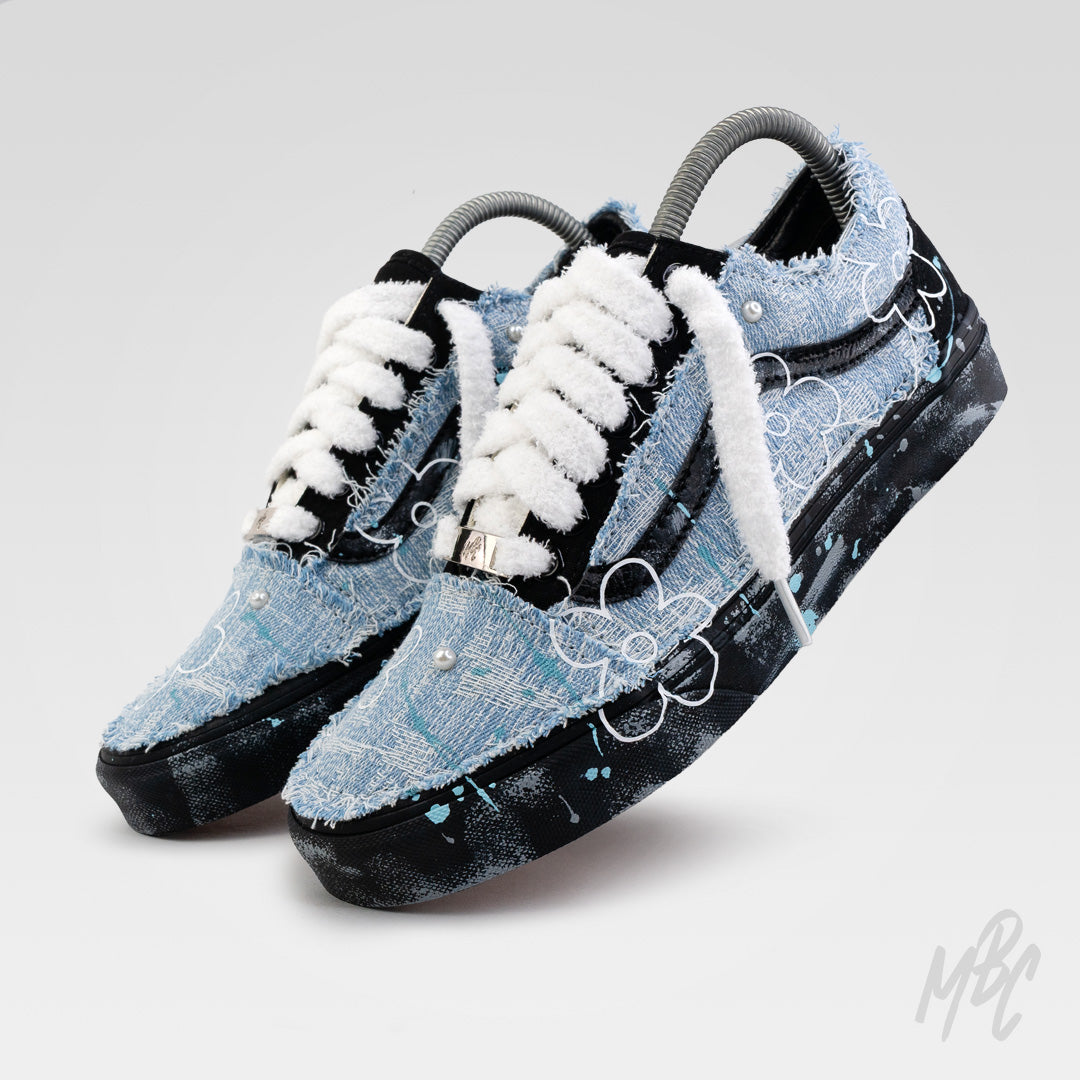 Custom Denim Bloom Vans Old Skool trainers featuring distressed denim, white floral artwork, pearl accents, fluffy white laces and hand-painted midsoles.