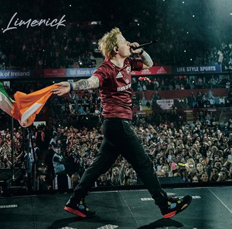 Ed Sheeran wearing custom Jordan 4 sneakers on tour