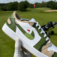 Close-up of the Fairway Camo Jordan 1 Low Golf custom golf shoe featuring a golf flag detail on the swoosh