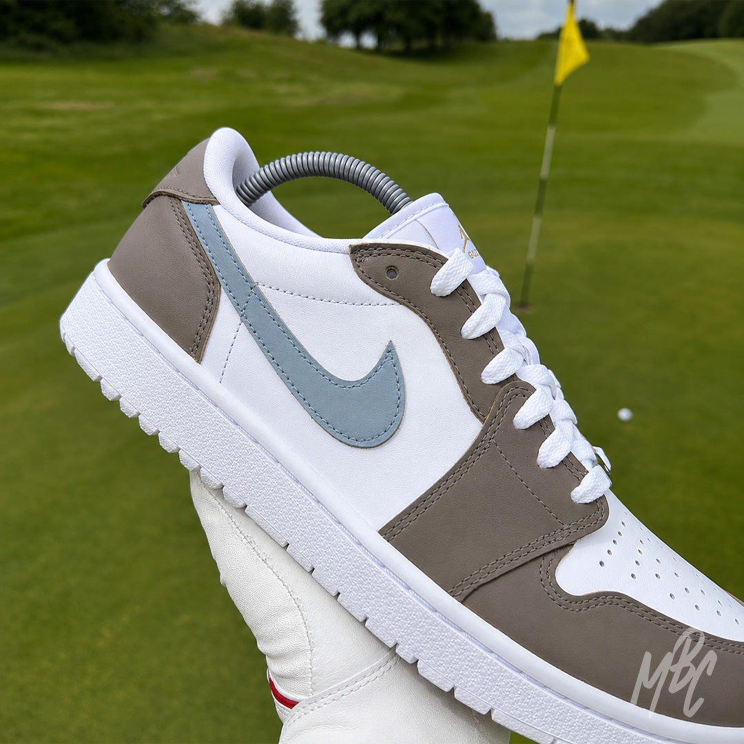 Close-up of the Fairway Fog Jordan 1 Low Golf custom golf trainer featuring taupe and light blue colour blocking