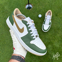 Fairway Gold custom Jordan 1 Low Golf shoes with hand-painted green and gold leather panels, photographed on a putting green.