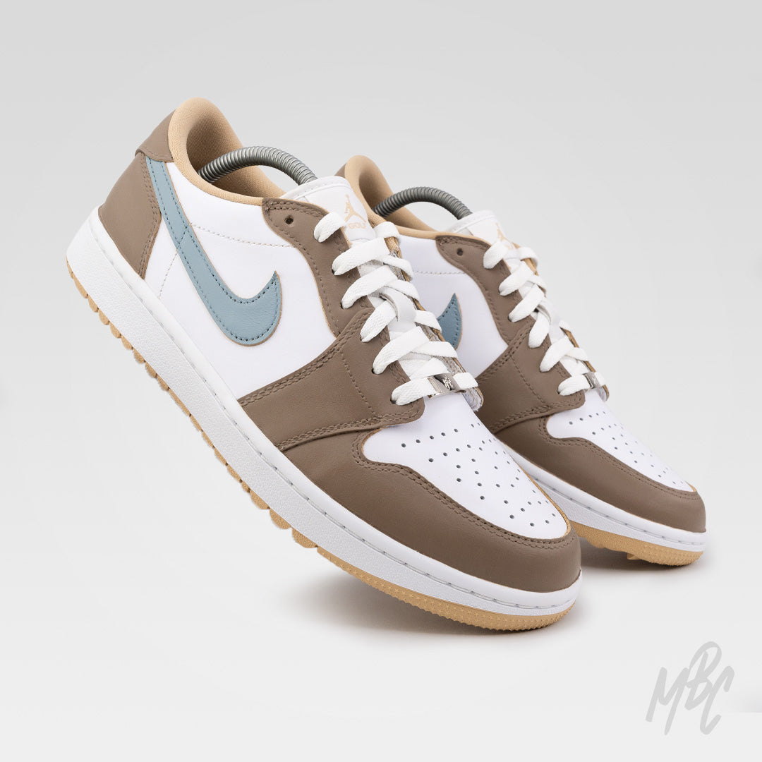 Pair of Fairway Fog Jordan 1 Low Golf custom golf shoes in taupe, white and light blue with premium leather construction