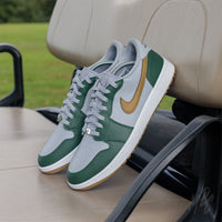 Fairway Gold Nike Jordan 1 Low Golf Custom Sneakers in grey in Golf Buggy on Golf Course