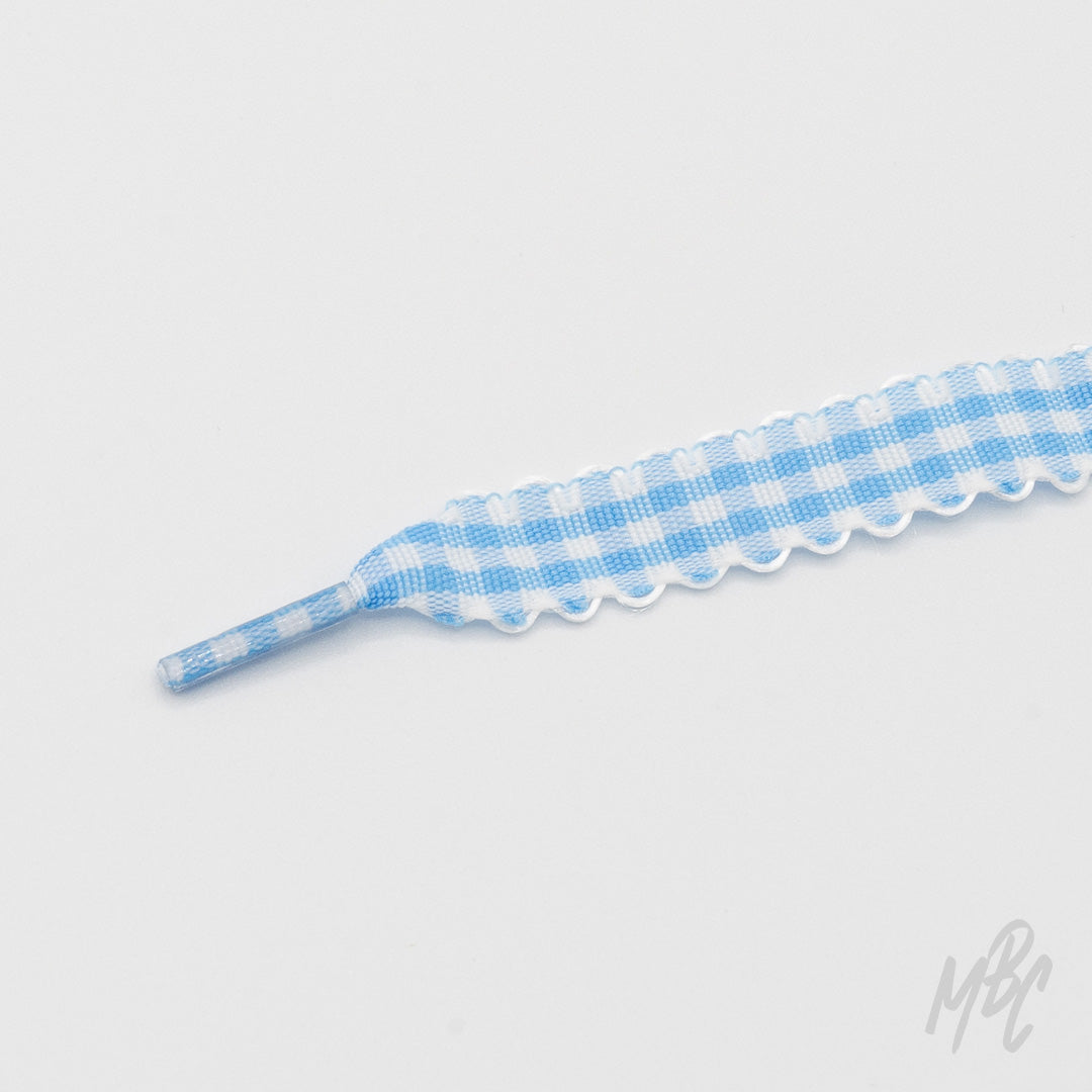 Blue gingham sneaker laces with scalloped edges and check pattern for custom trainers and personalised footwear