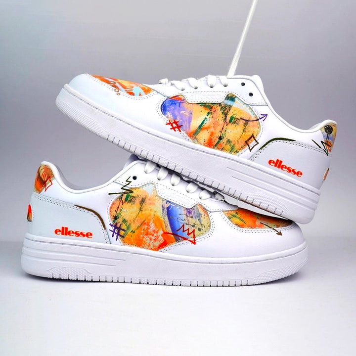 White ellesse trainers with Google branding and custom made material cut, glued and sewn to toe boxes, side panels and heels