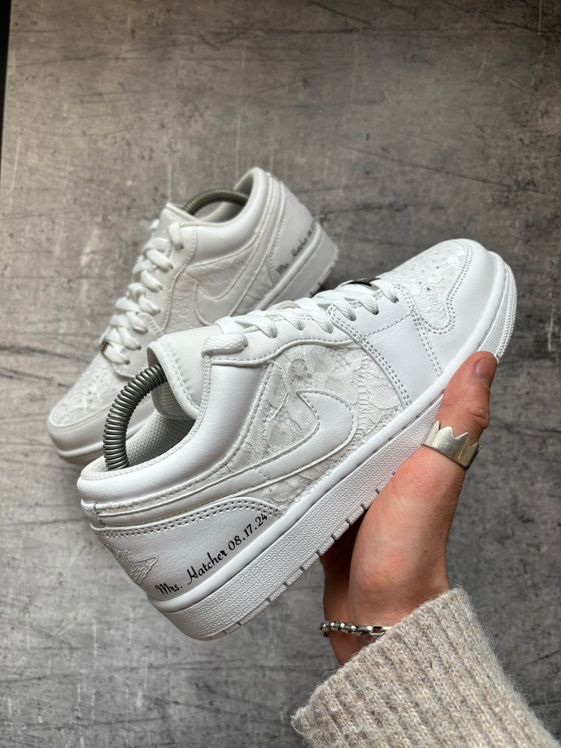 Custom wedding Jordan 1 Low sneakers with lace detailing, personalised surname and wedding date