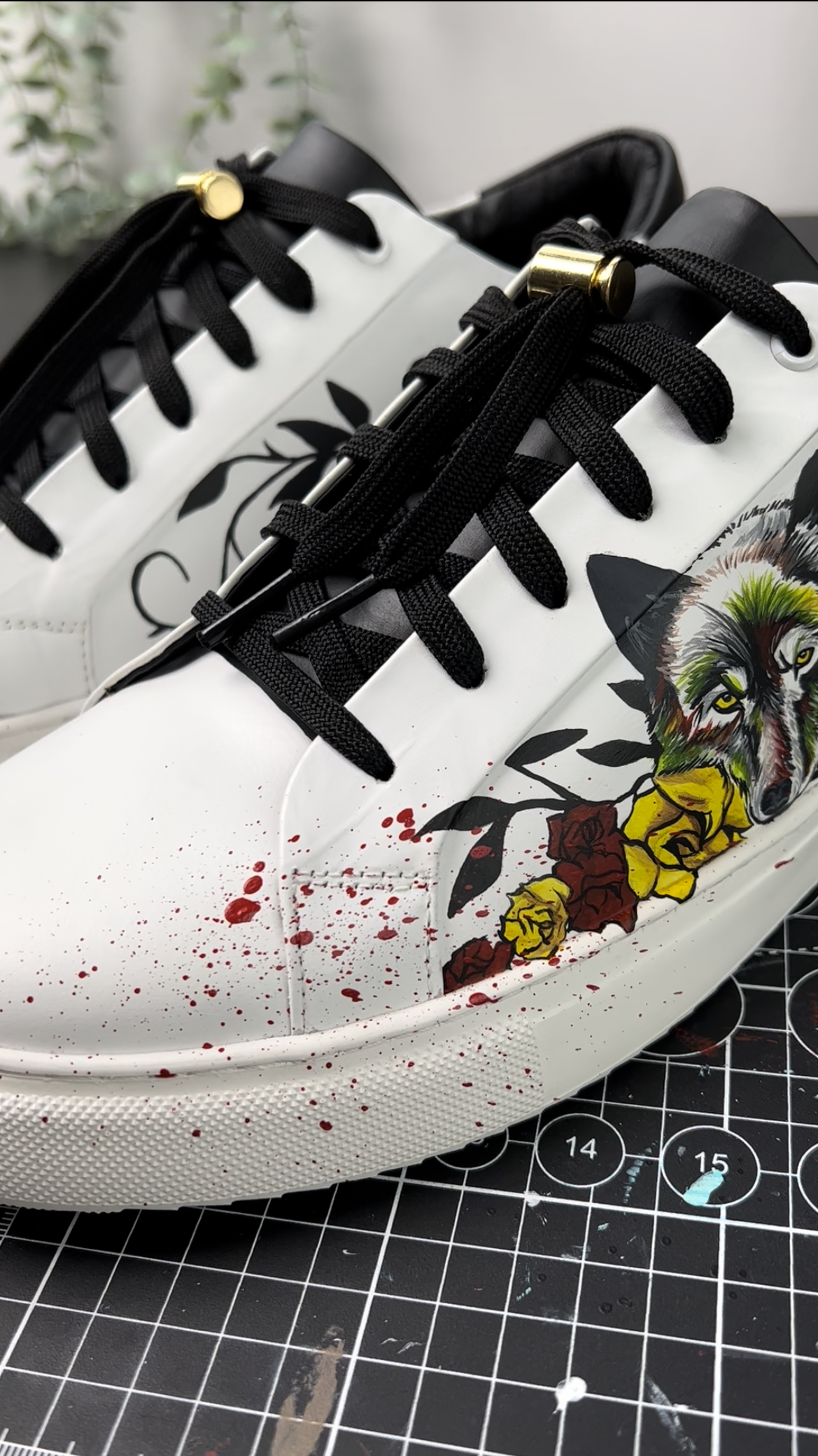 custom trainers with bullet train's bad bunny characteristics hand painted along with paint splatted blood