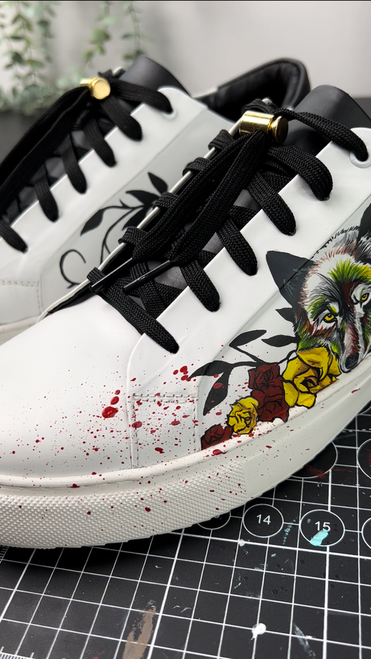 custom trainers with bullet train's bad bunny characteristics hand painted along with paint splatted blood