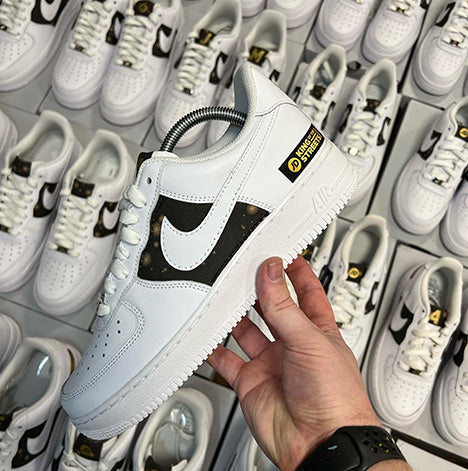 Bulk order of custom Air Force 1s with JD branding for a christmas street party event.
