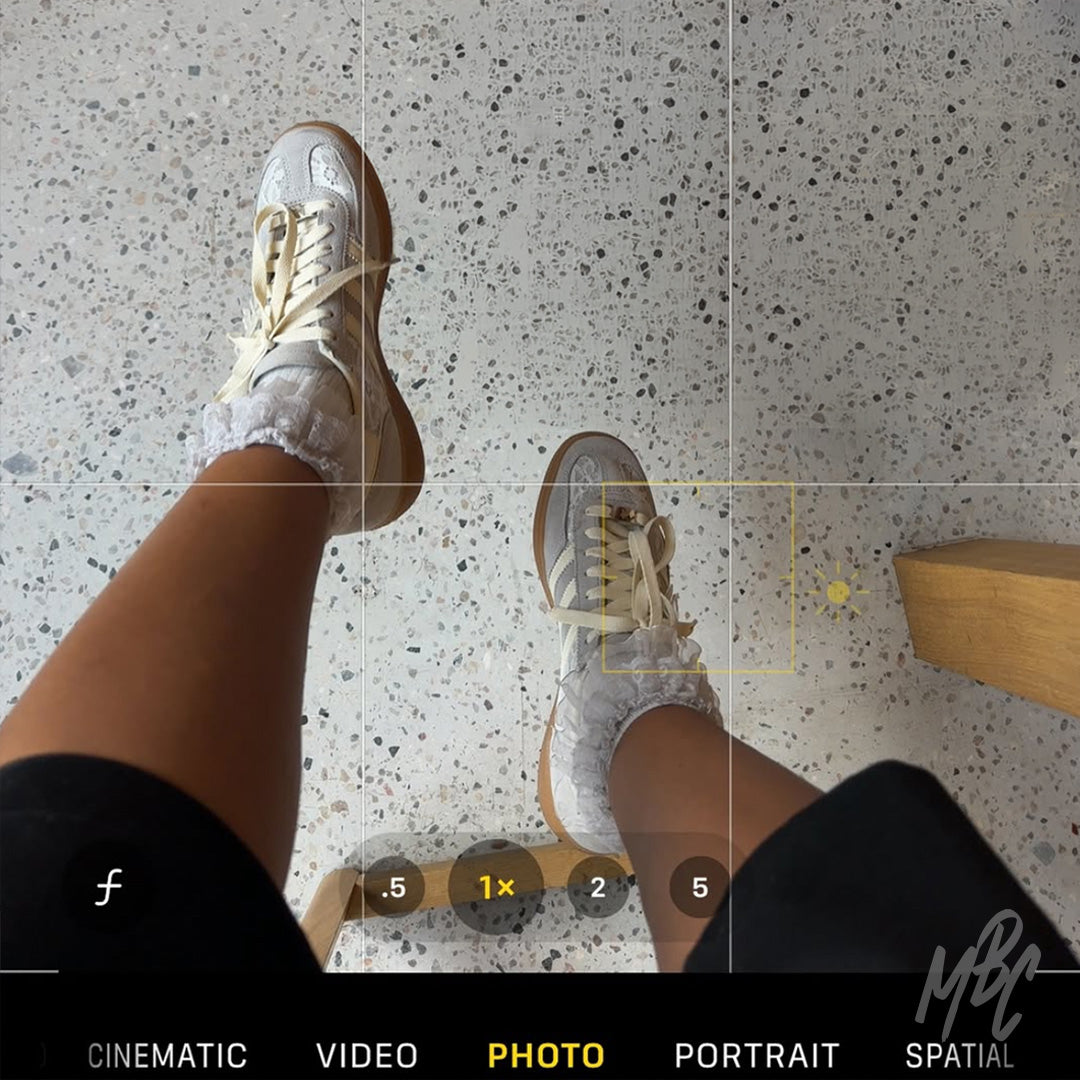 On-foot view of Lacey Flower custom Adidas Spezial trainers with lace detailing and gum sole