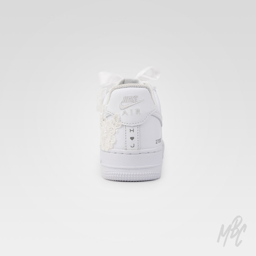 Back view of white Air Force 1 custom with lace appliqué wrapping the heel and personalised initials