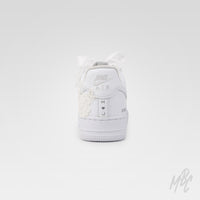Back view of white Air Force 1 custom with lace appliqué wrapping the heel and personalised initials