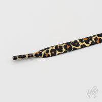 Leopard print flat sneaker laces with tan, black and orange pattern for custom trainers and statement sneakers