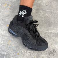 Side profile of the Midnight Veil custom Nike Air Max 95 showcasing black floral appliqués, satin ribbon laces, decorative black bead laces and a monochrome black design.