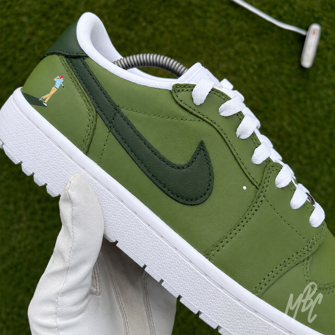 Close-up of Nike Air Jordan 1 Low Golf Off The Tee custom golf shoe with green colourway and golfer illustration detail