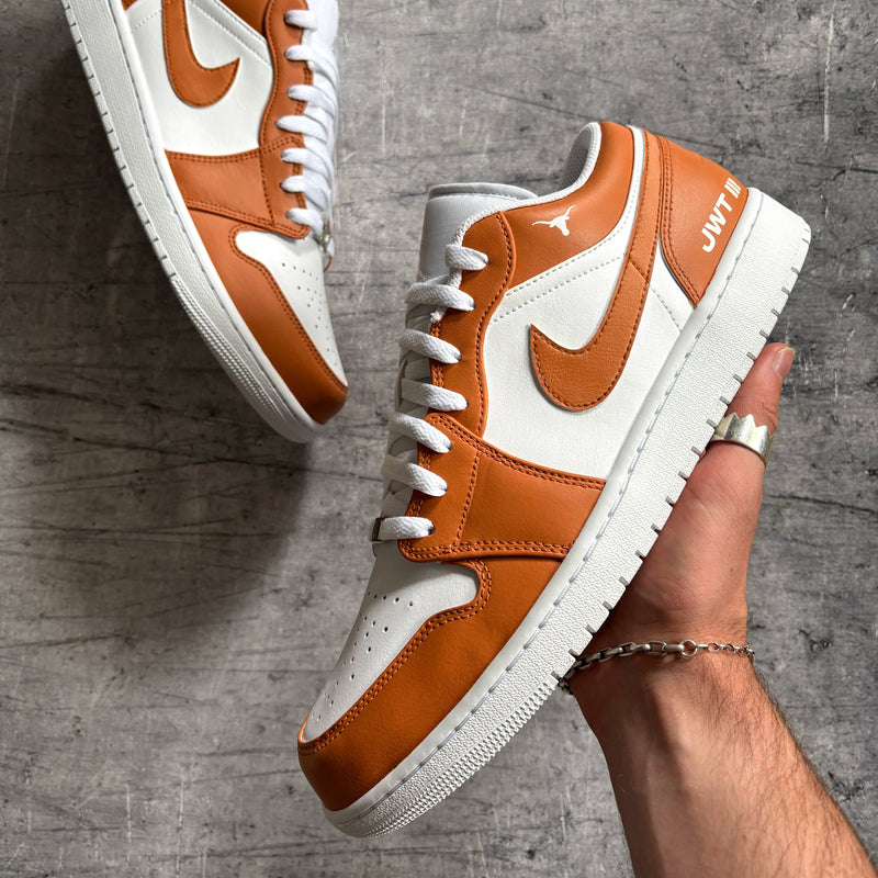 Custom Jordan 1 Low with orange and white colourway and personalised initials