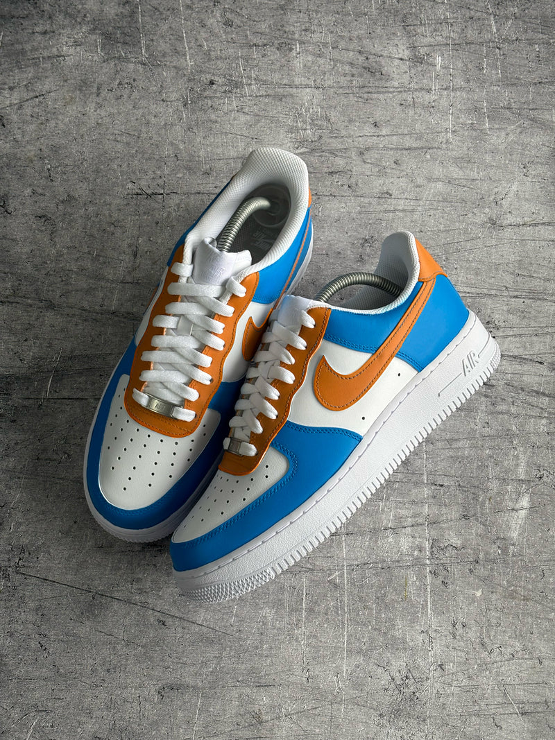 Custom Nike Air Force 1 in bright blue and orange colourway with colour-blocked panels