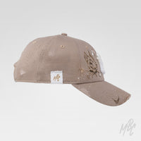 K9 custom New Era NY cap in beige with distressed finish, paint splatter and Doberman illustration