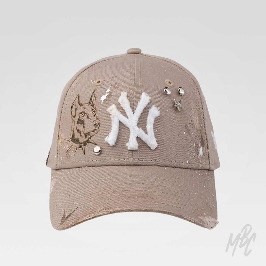 K9 New Era NY custom cap with frayed NY logo, metal studs and hand detailed Doberman design