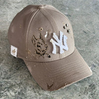 K9 custom New Era NY cap in beige with distressed finish, paint splatter, metal studs and Doberman artwork