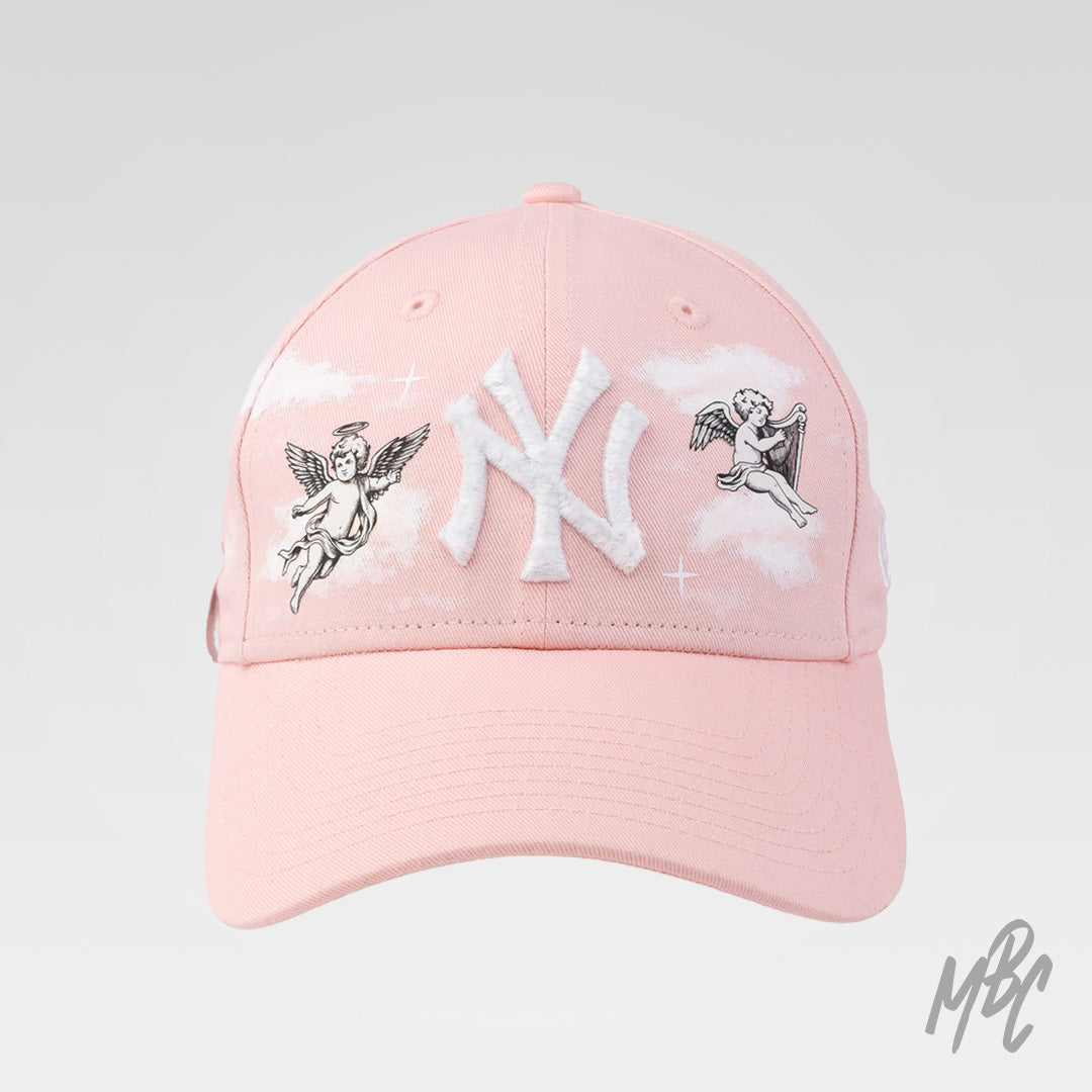 Pink Heaven New Era NY custom cap with cherub angel illustrations, hand painted clouds and raised NY logo