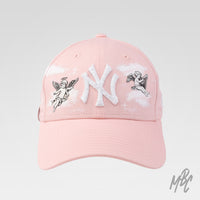 Pink Heaven New Era NY custom cap with cherub angel illustrations, hand painted clouds and raised NY logo