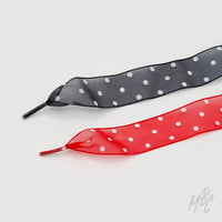 Black and red sheer ribbon sneaker laces with white polka dot pattern for custom trainers and fashion footwear