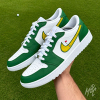 Nike Air Jordan 1 Low Golf Putting Greens 2.0 custom golf trainers in hand on course, green and white colourway