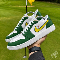 Nike Air Jordan 1 Low Golf Putting Greens 2.0 custom sneakers in hand on golf course, green and white golf shoes