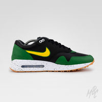 Side profile of Putting Greens Air Max 1 custom golf shoe with green and black upper, visible Air unit and golf-themed detailing