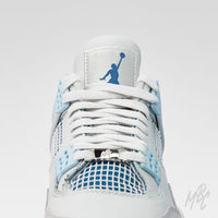 Custom Jordan 4 Renaissance with white tongue tab and blue Jumpman logo front view