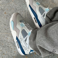 Renaissance custom Jordan 4 on foot top view with blue mesh panels and hand painted details