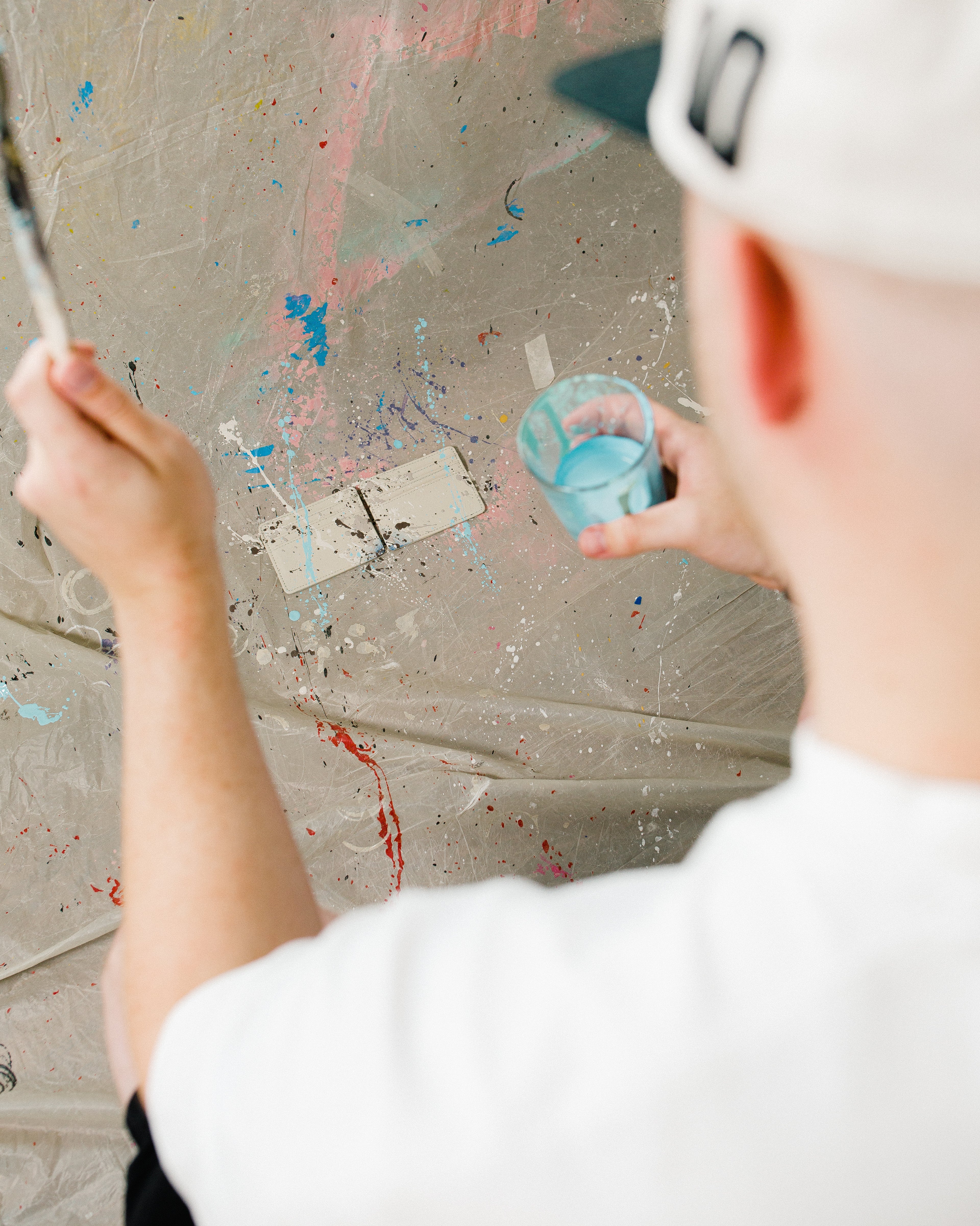paint splatting cardholders with toblerone colours