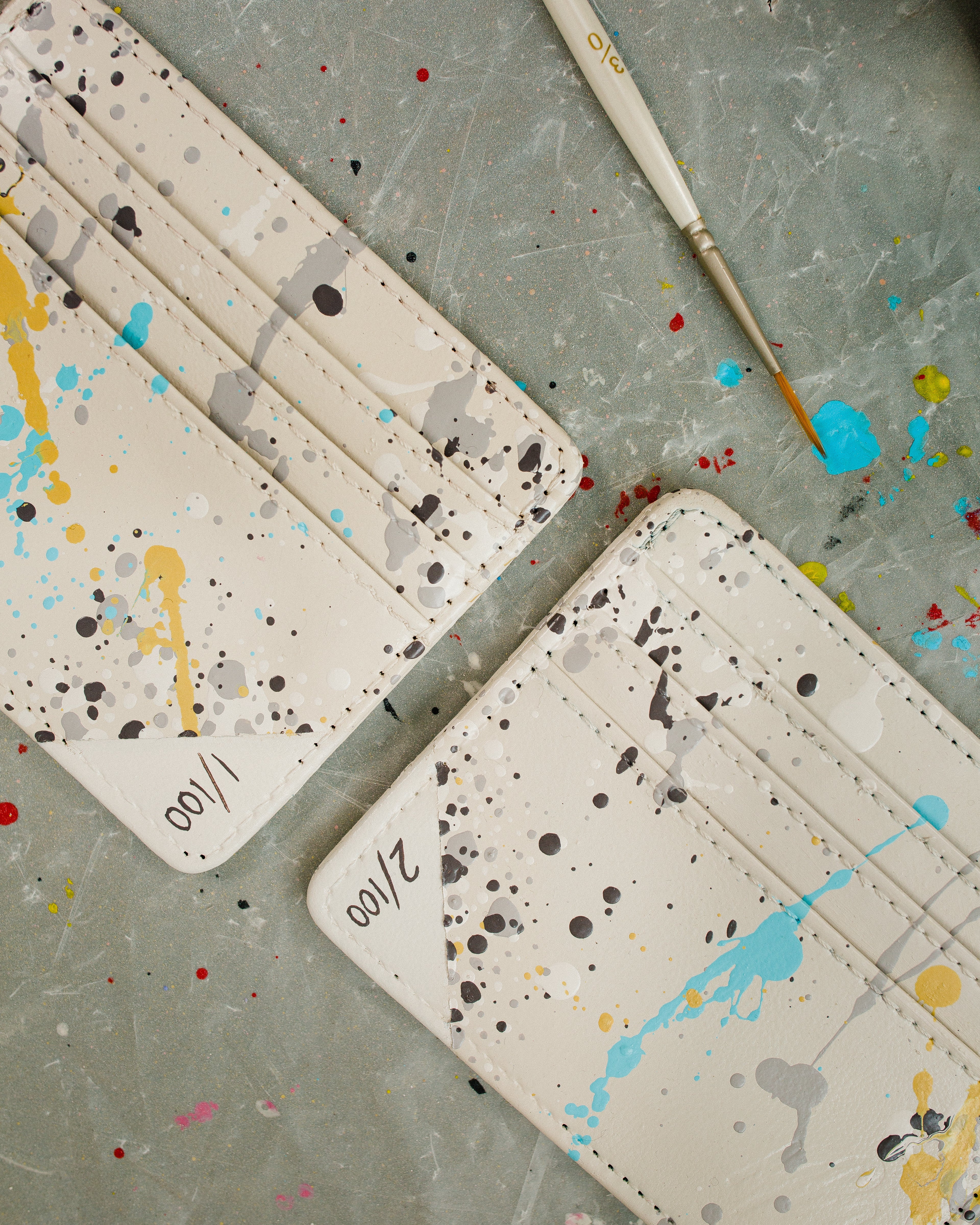 custom hand painted cardholders with toblerone colours painted splatted 