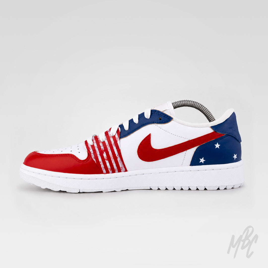Side view of the custom Stateside Drive Jordan 1 Low Golf featuring red Swoosh, blue heel with white stars and distressed American flag detailing